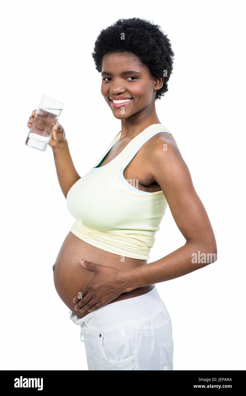 Pregnant woman drinking water Stock Photo Alamy