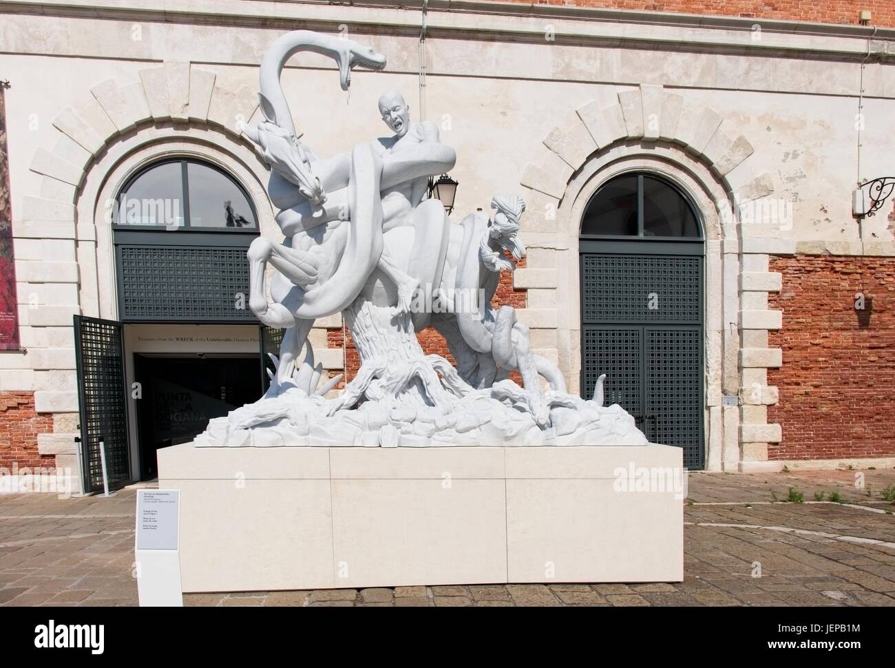 Venezia Veneto Italia. The fate of a banished man (Standing), Carrara marble by Damien Hirst exposed on Punta della Dogana Stock Photo