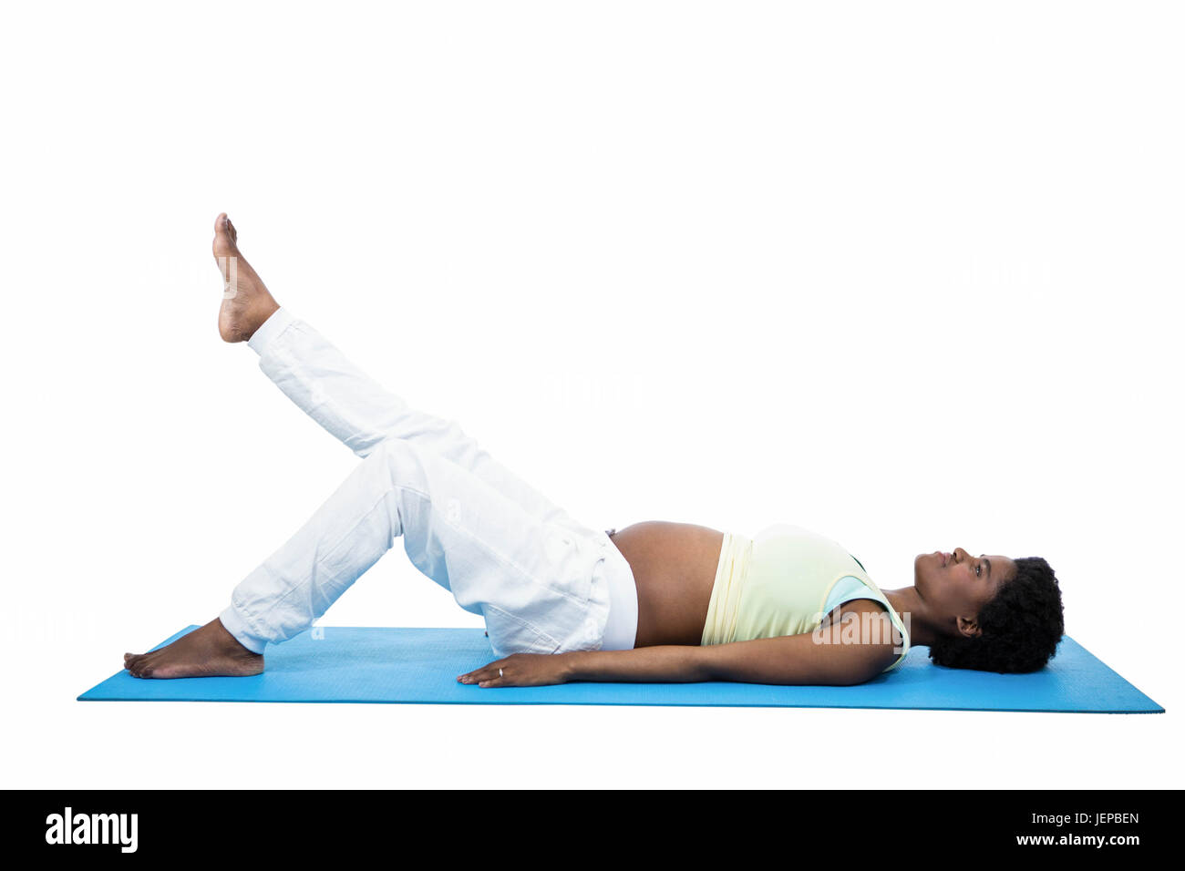 Pregnant woman doing exercise on mat Stock Photo Alamy