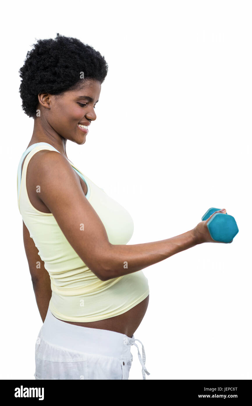 View of Pregnant woman lifting dumbbell Stock Photo - Alamy