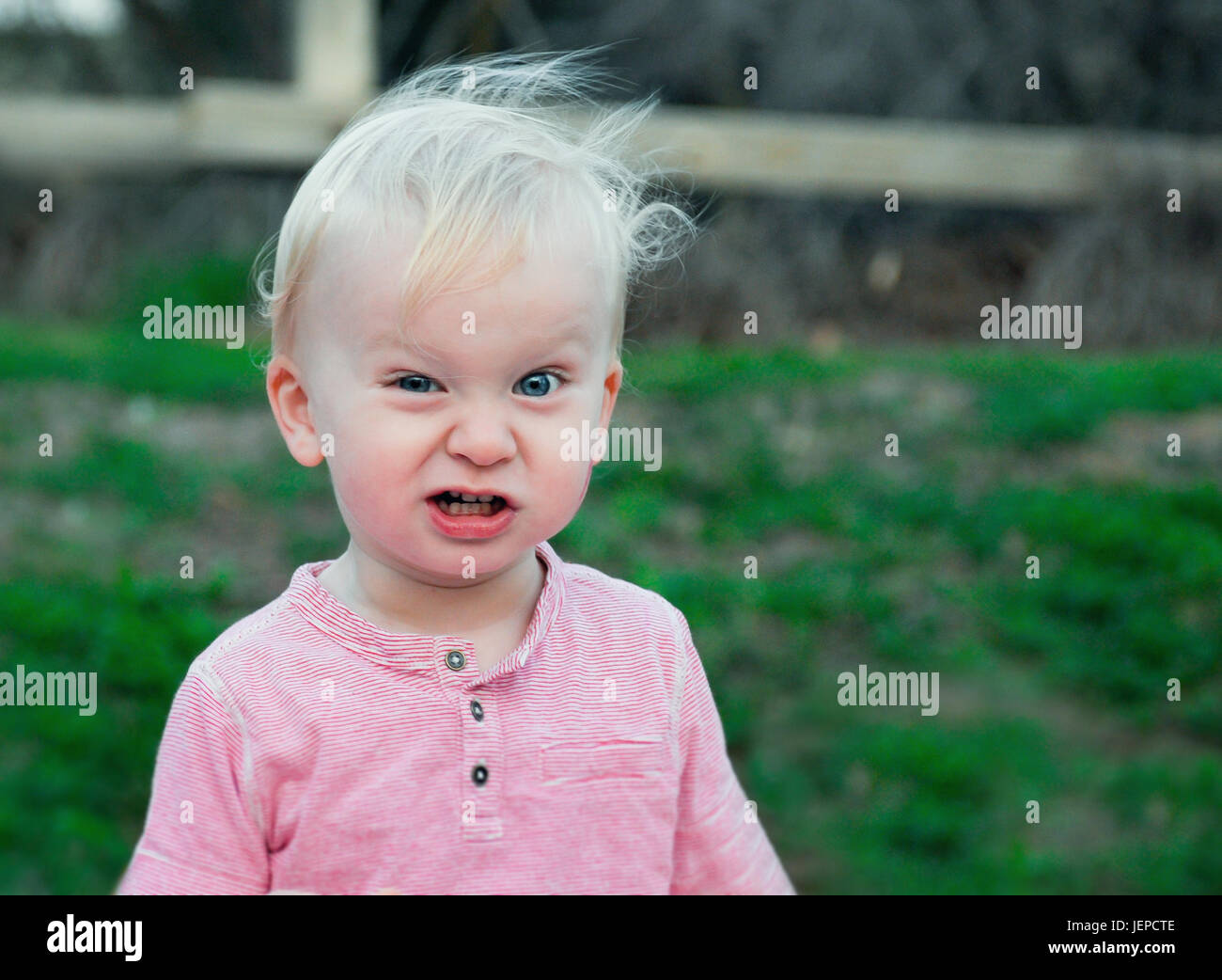 Little boy making funny face Stock Photo