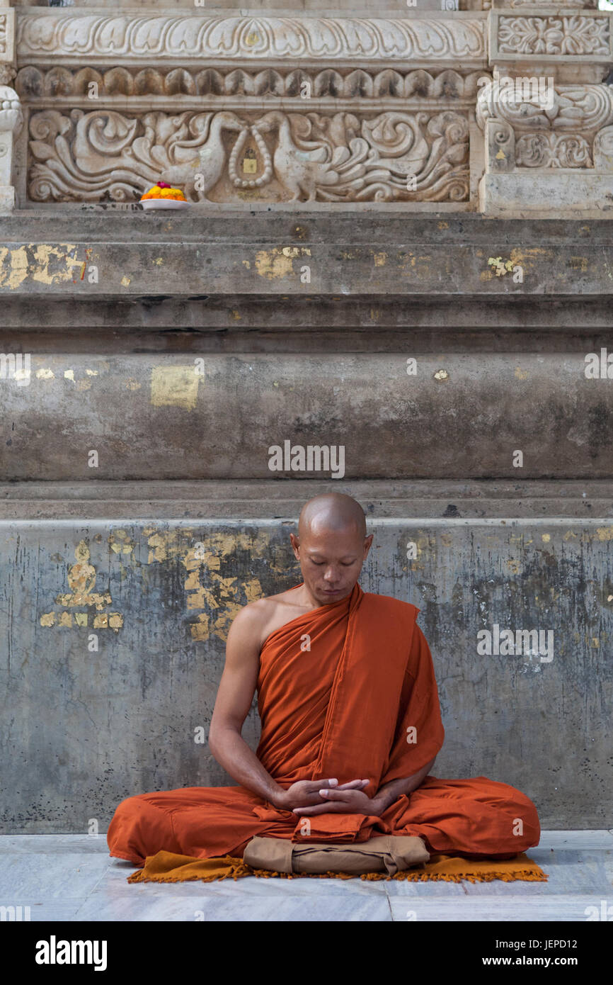 A Monk in Meditation at the Mahabodhi Temple in Bodhgaya Stock Photo