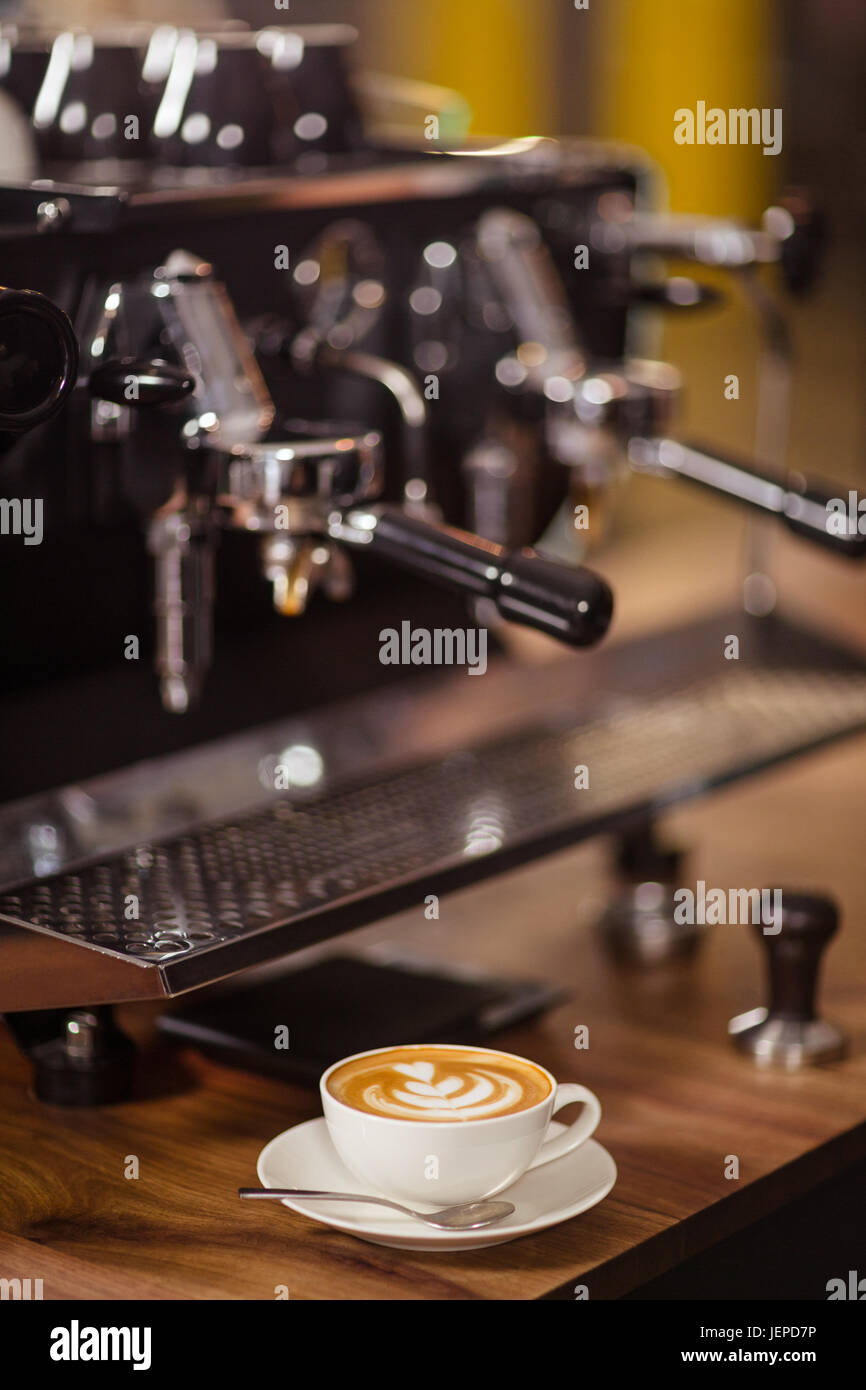 Coffee machine and cappuccino Stock Photo Alamy
