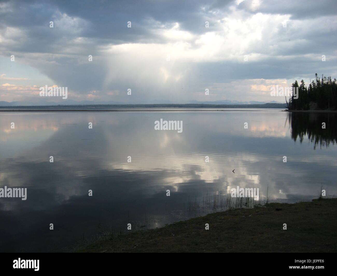 Reflections on Yellowstone Lake Stock Photo