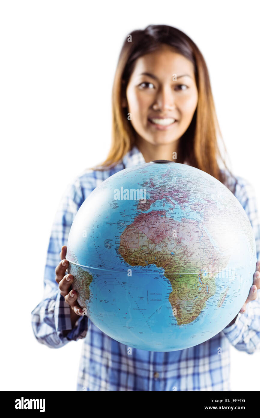 Smiling asian woman holding a globe Stock Photo - Alamy