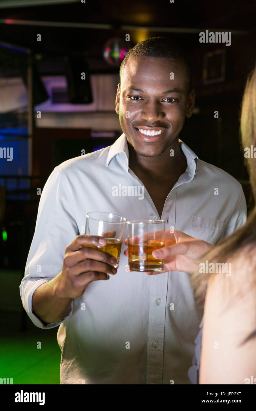 Portrait of man toasting his whisky glass Stock Photo Alamy