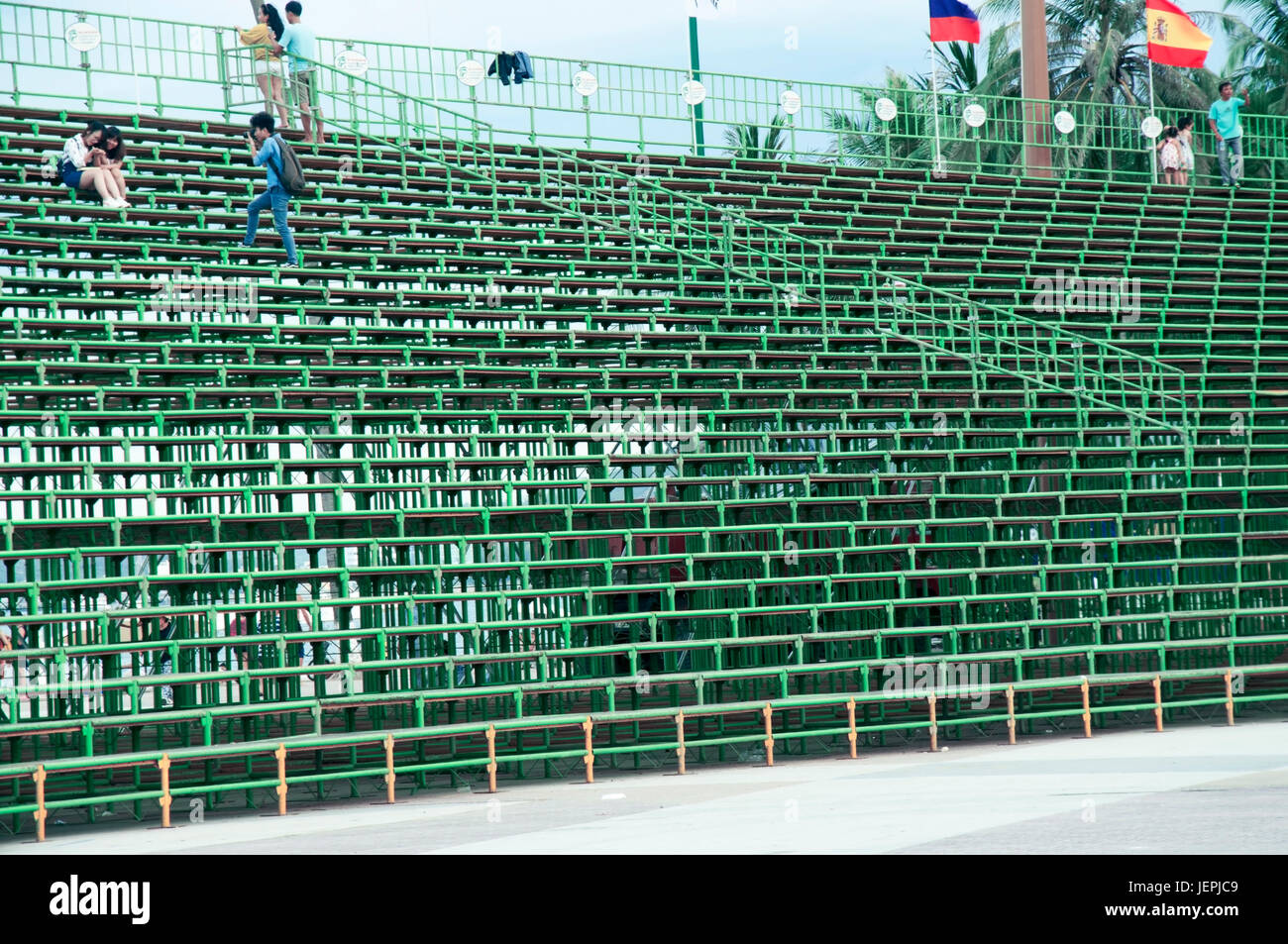 Workers are assembling a rostrum for the audience before the Festival of the Sea in Nha Trang, Vietnam. Stock Photo