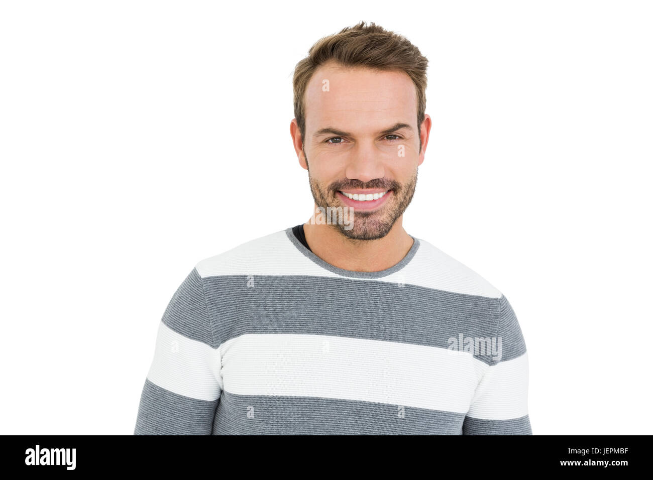 Happy young man in winter wear Stock Photo - Alamy