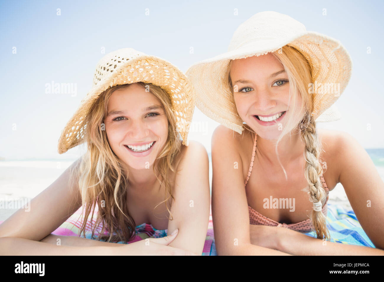 Women lying on a beach hi-res stock photography and images - Alamy