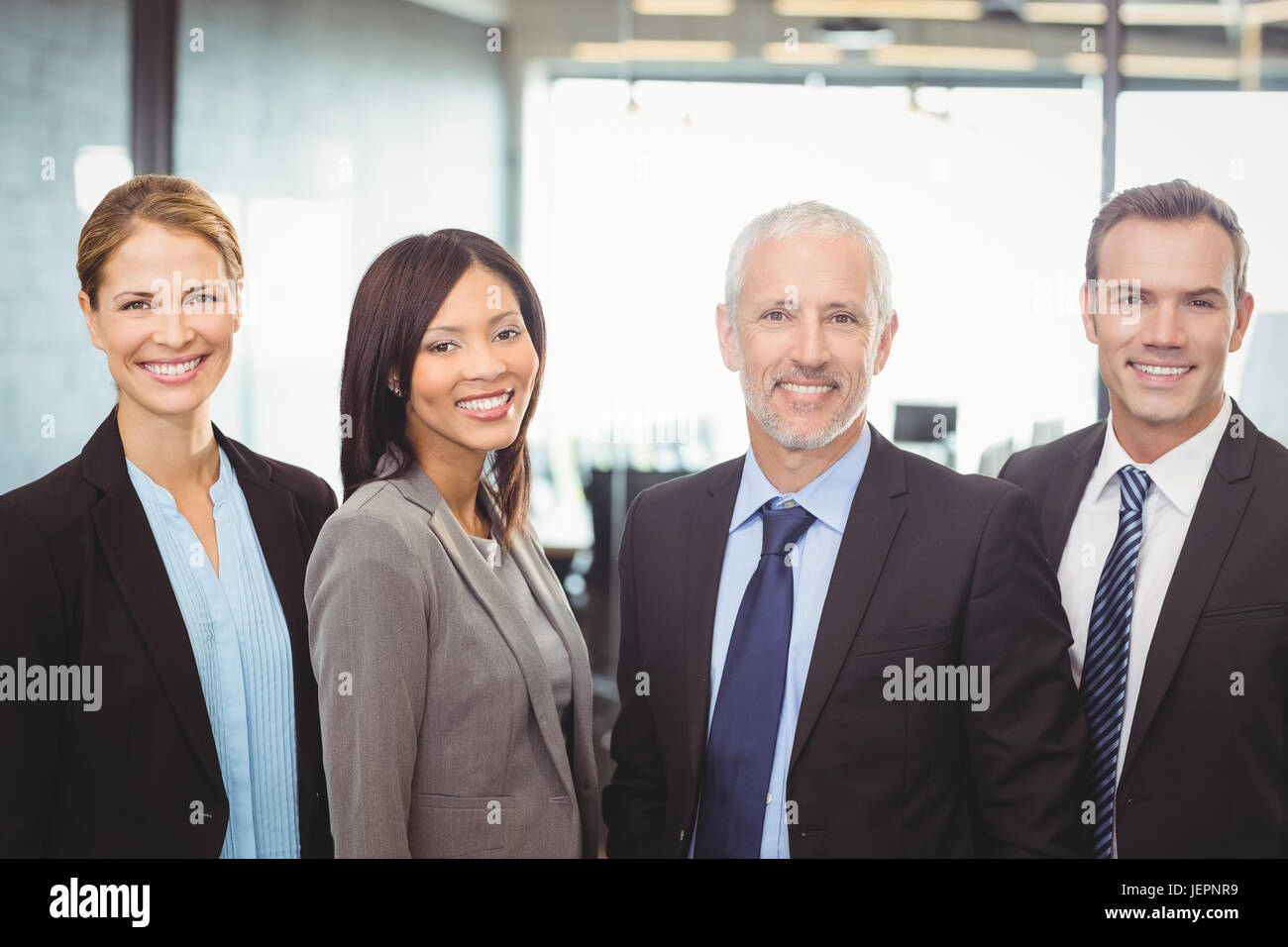 Portrait of businesspeople smiling Stock Photo - Alamy