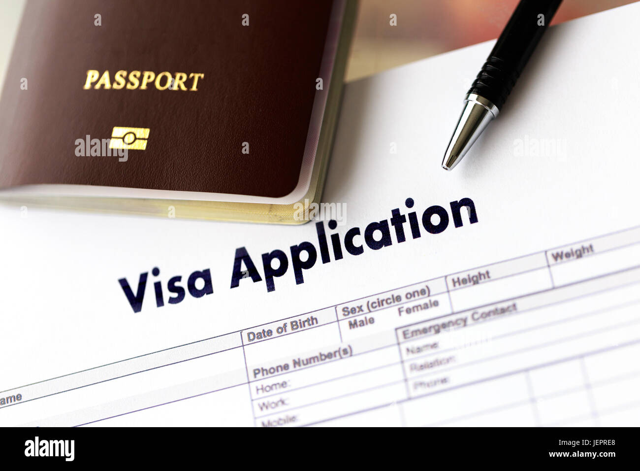 Visa application form to travel Immigration a document Stock Photo - Alamy