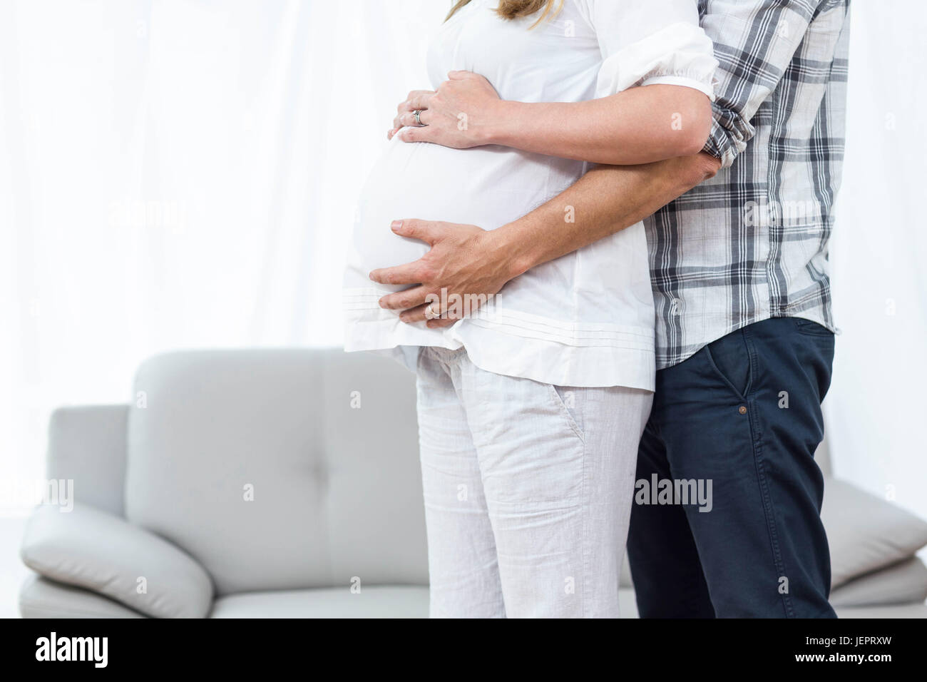 Happy couple expecting baby Stock Photo - Alamy