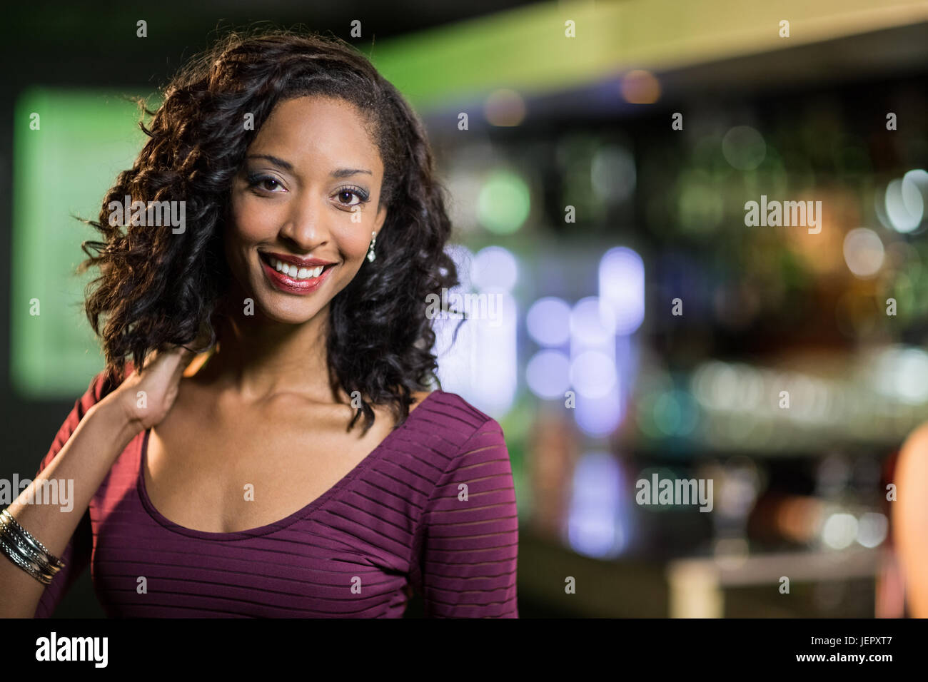 Portrait of smiling woman Stock Photo - Alamy