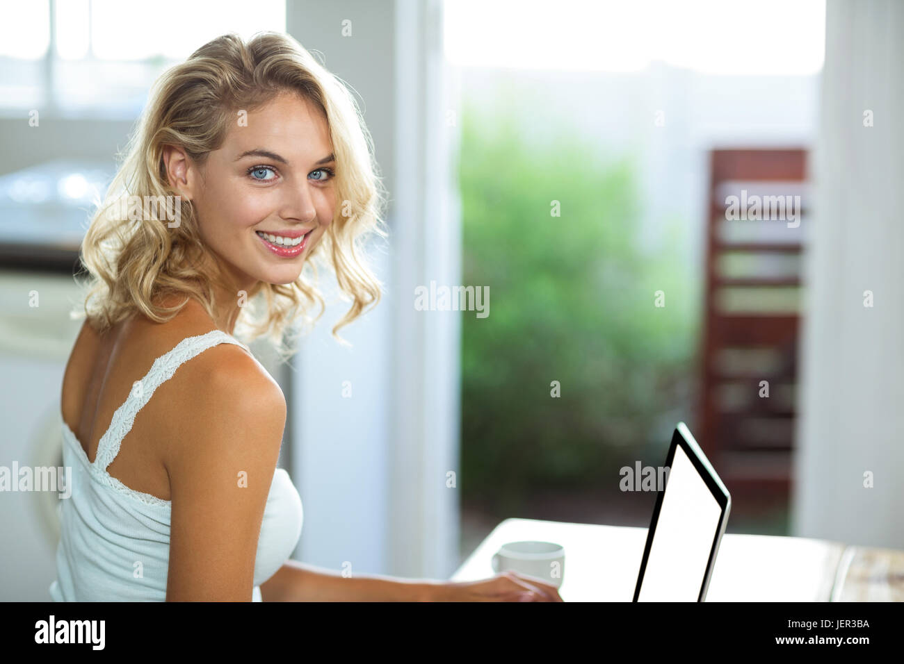 Portrait of beautiful woman at home Stock Photo - Alamy