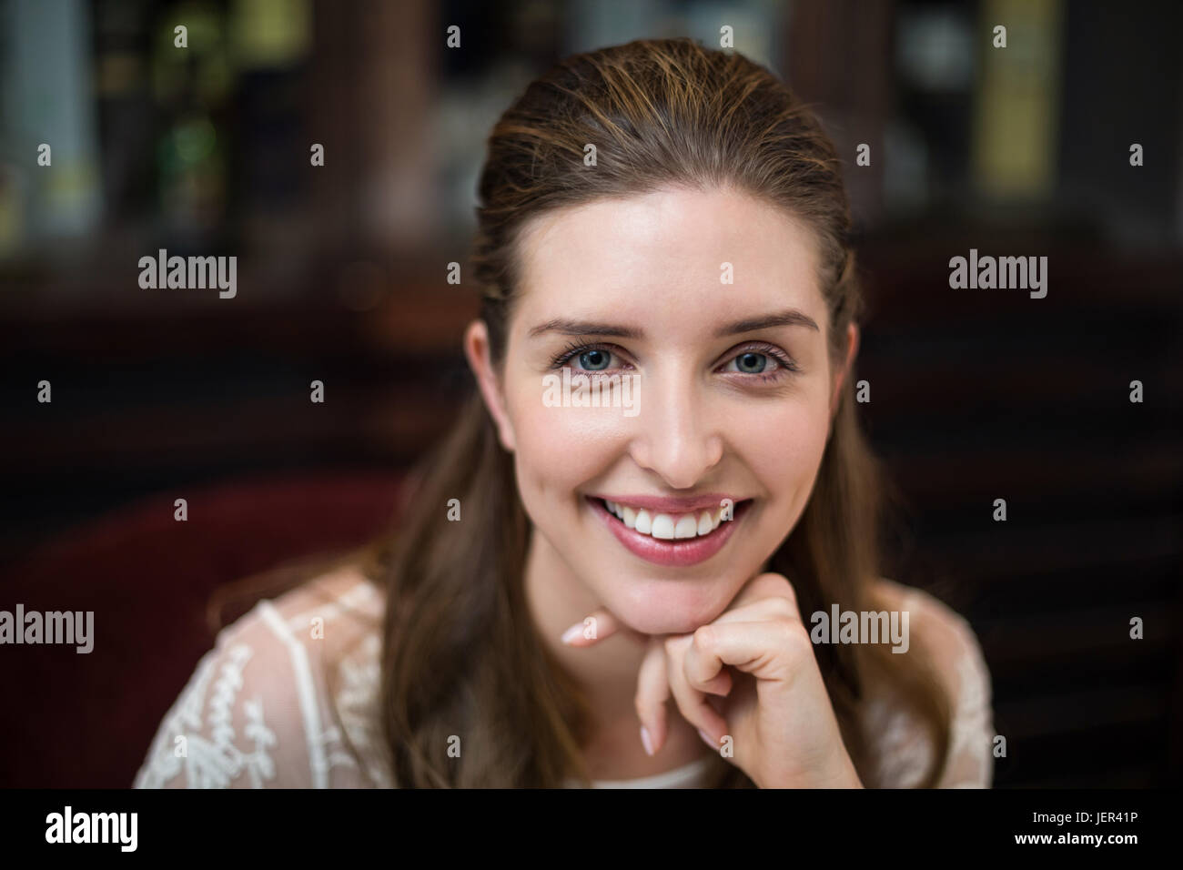 Woman chin looking up happy hi-res stock photography and images - Alamy