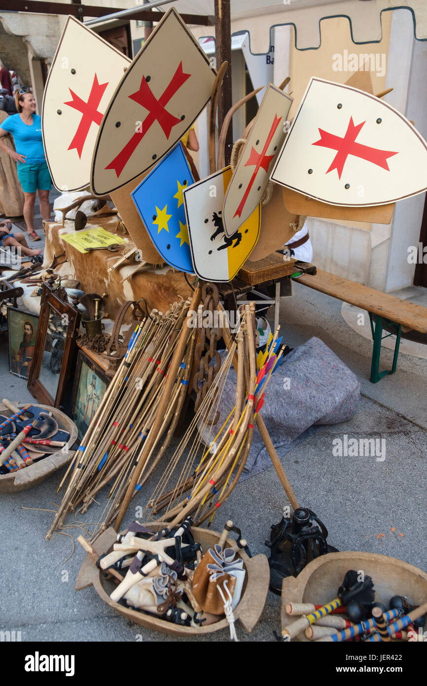 Wooden toy shields and weapons sold at Škofja Loka Festival of History - Historial. Stock Photo