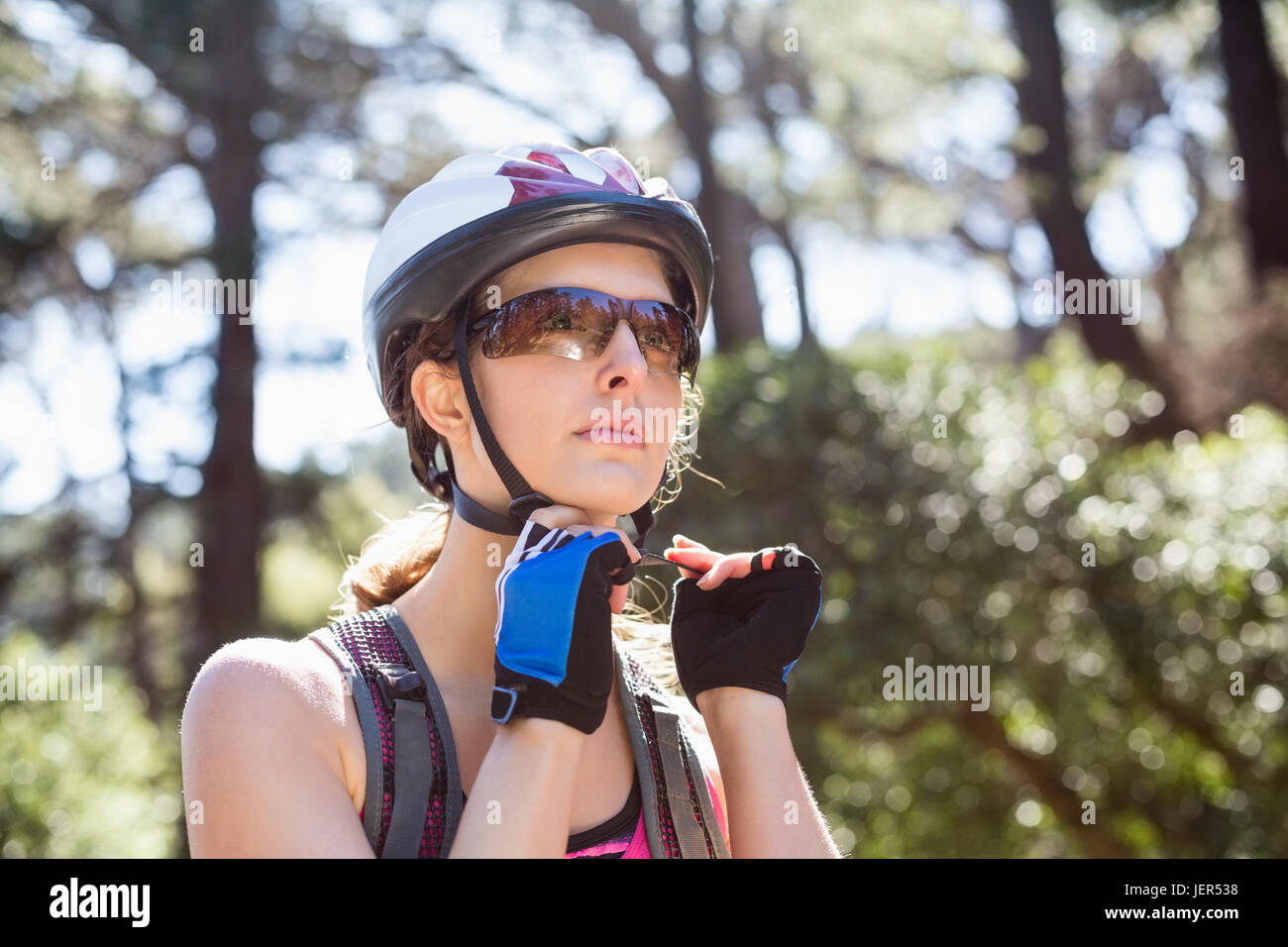 Young woman thinking helmet hi-res stock photography and images - Alamy