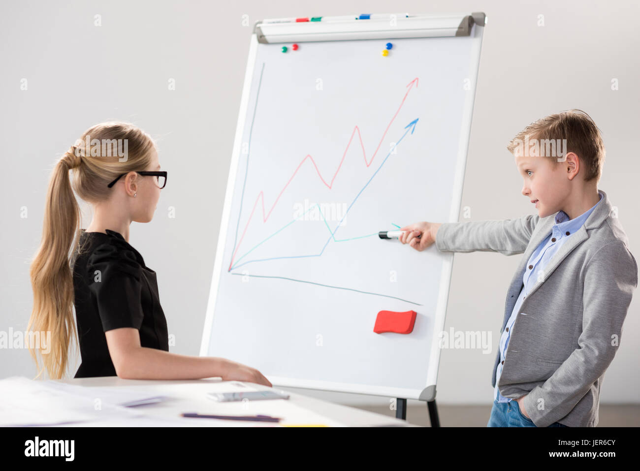 Children in formal clothes making presentation, children in business concept Stock Photo