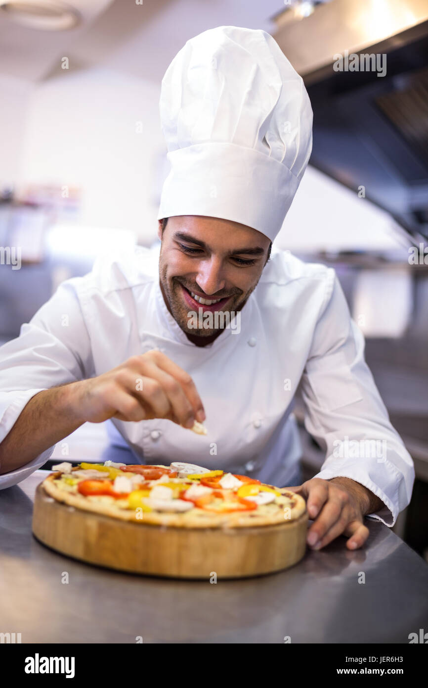 Pizza chef making pizza Stock Photo