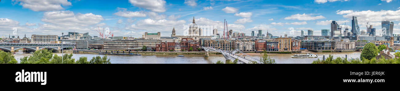 View from Tate Modern showing river Thames, St Paul's Cathedral, fantastic wide angle river  a lovely blue sky with white clouds Stock Photo