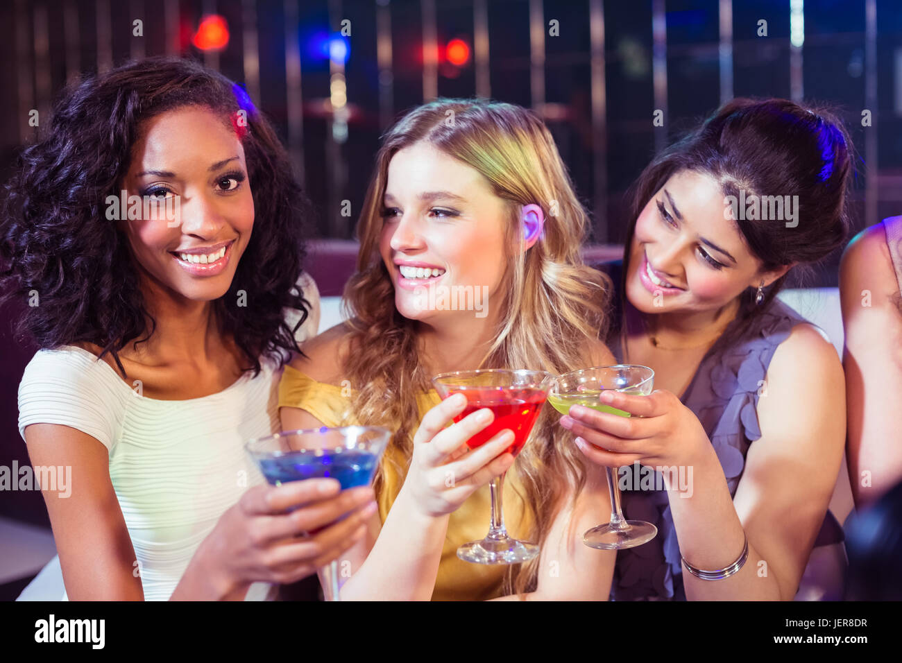 Pretty girls with cocktails Stock Photo - Alamy