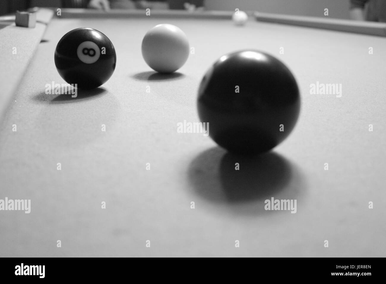 The game of pool. The eight ball stares you down Stock Photo - Alamy