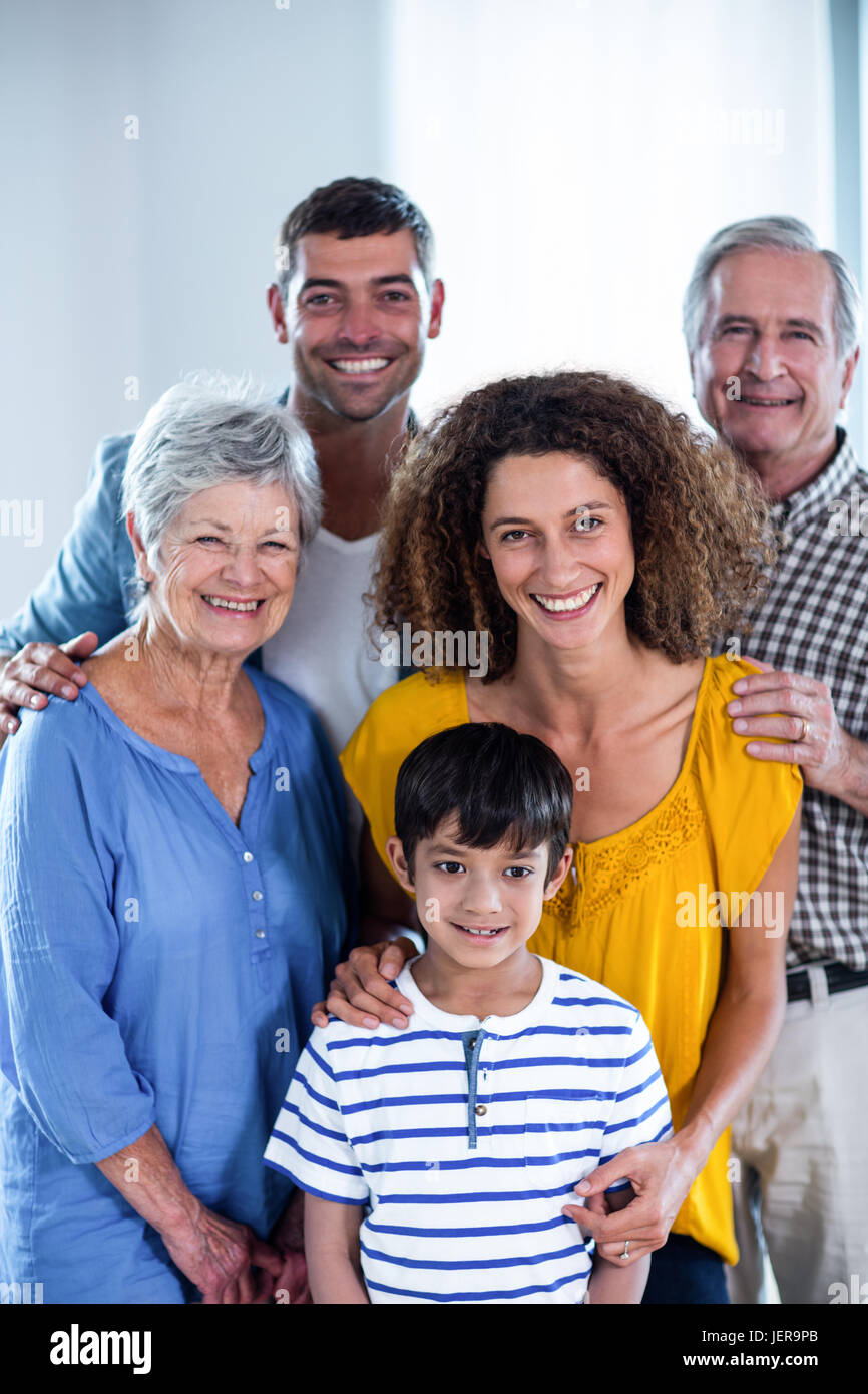 Portrait of happy family standing together Stock Photo Alamy