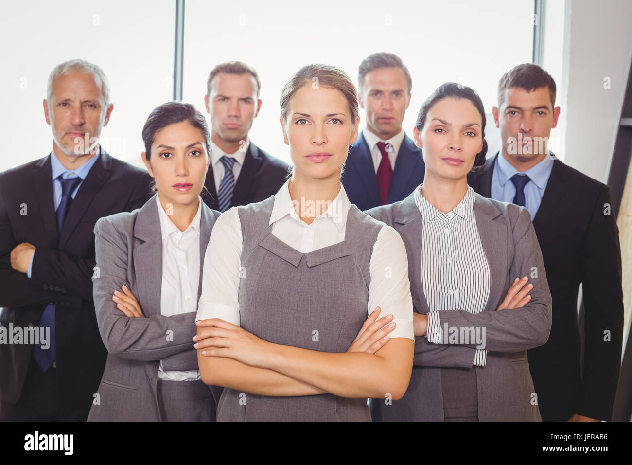 Team of businesspeople posing together Stock Photo - Alamy