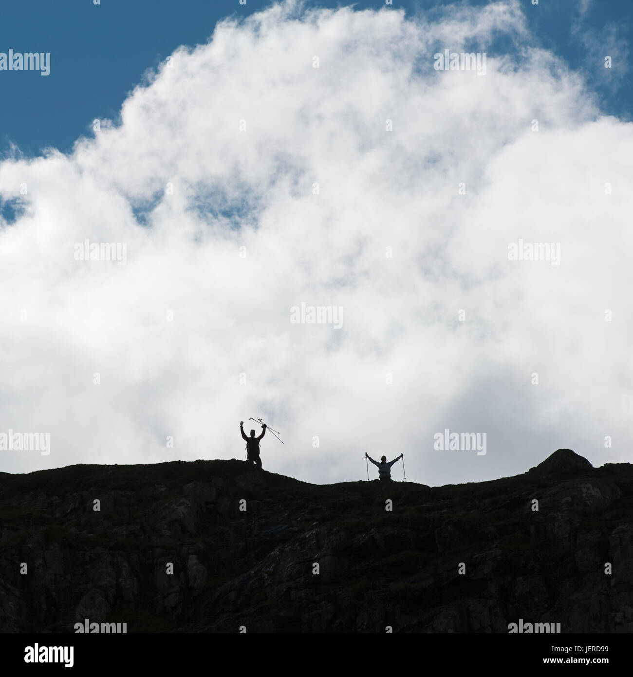 Hikers on top of mountain Stock Photo - Alamy