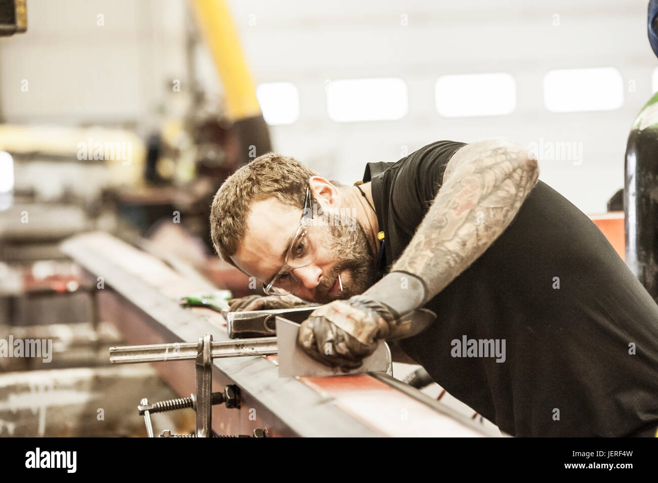 Man working in workshop Stock Photo