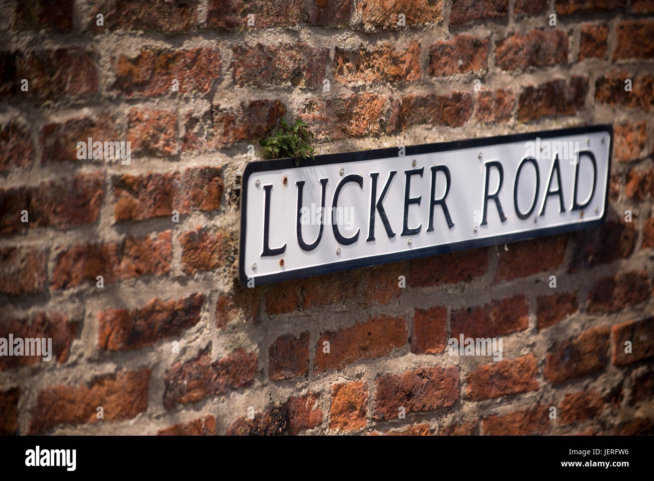Lucker Road street sign, Bamburgh, Northumberland Stock Photo