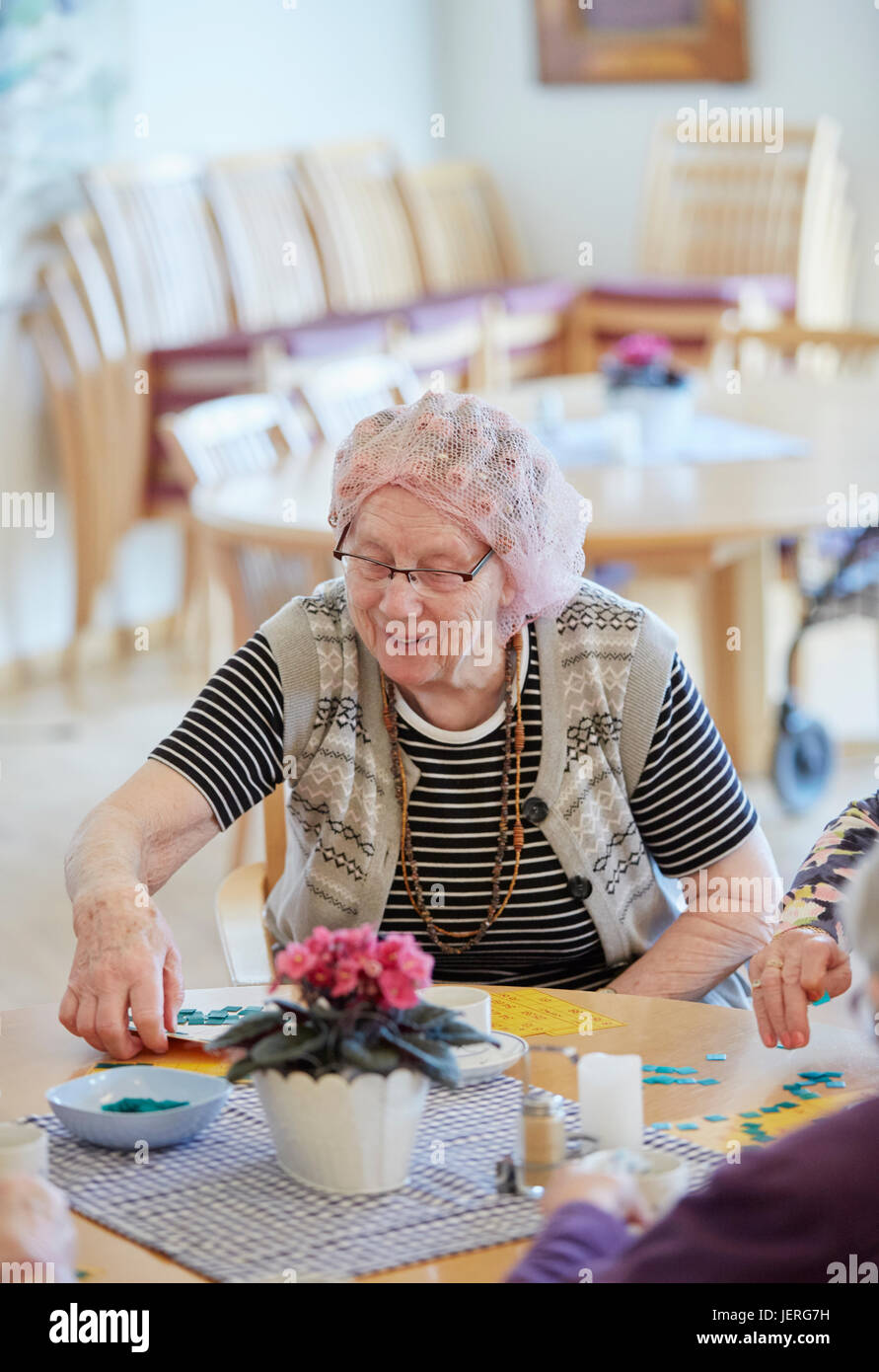 Senior woman in care home Stock Photo