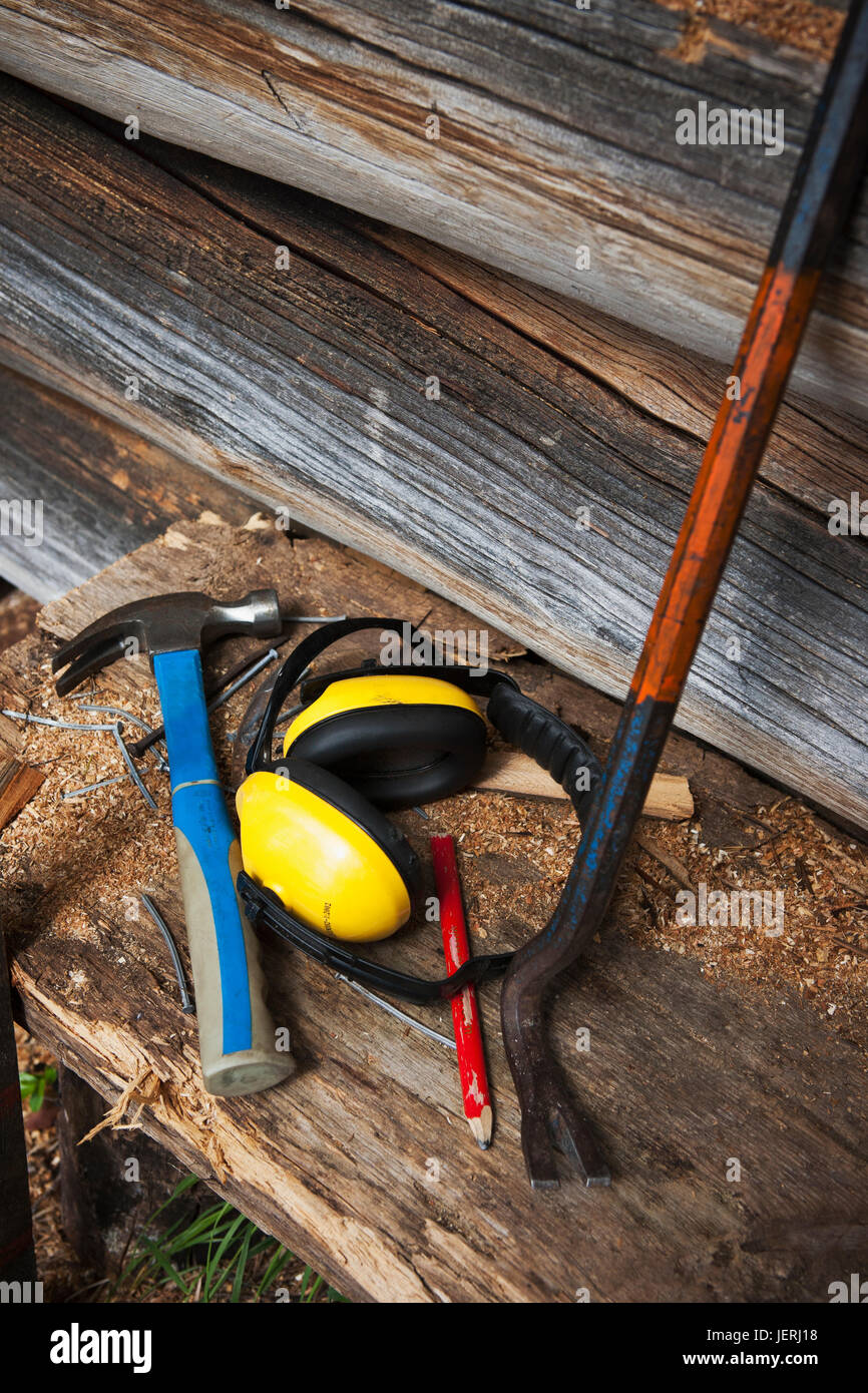 Crowbar, hammer and ear defenders, high angle view Stock Photo Alamy