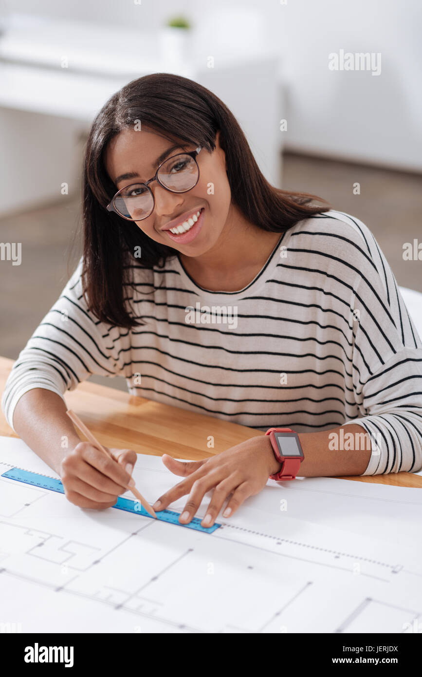 Professional female engineer using drawing tools Stock Photo