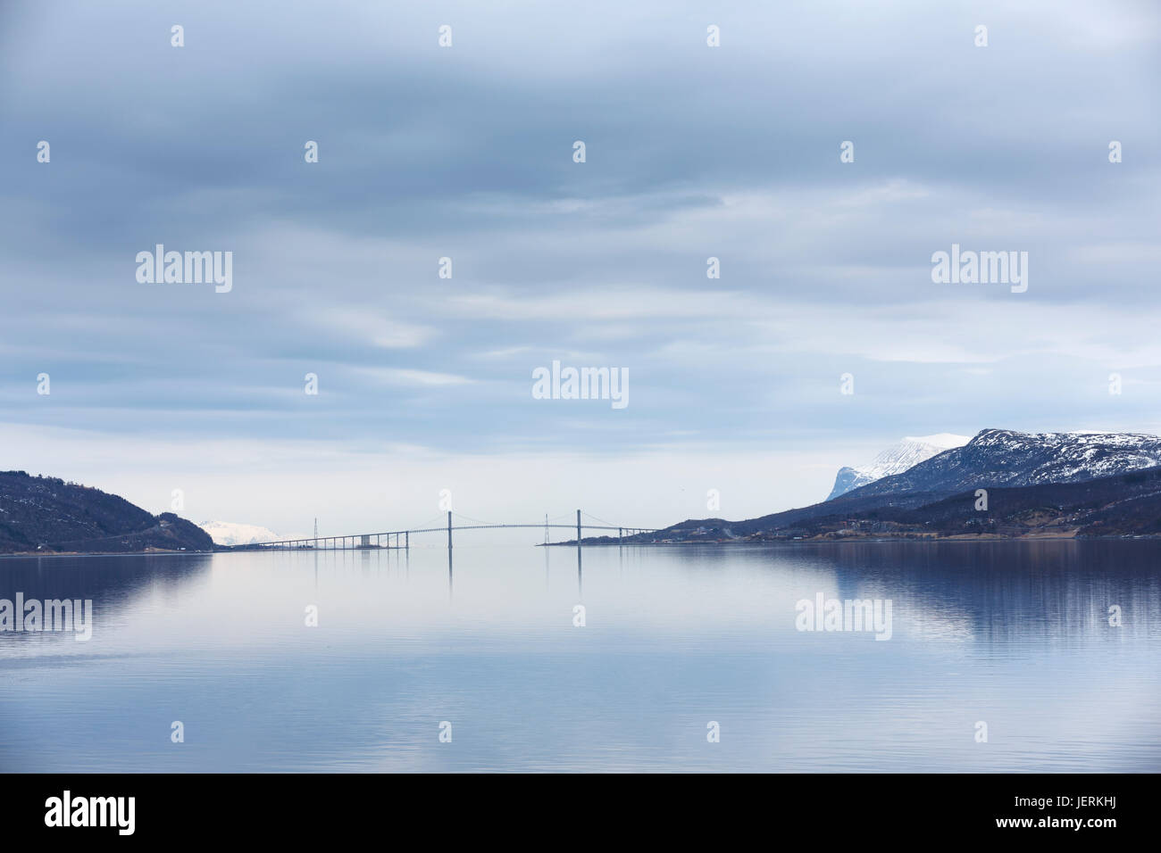 Bridge under cloudy sky Stock Photo - Alamy