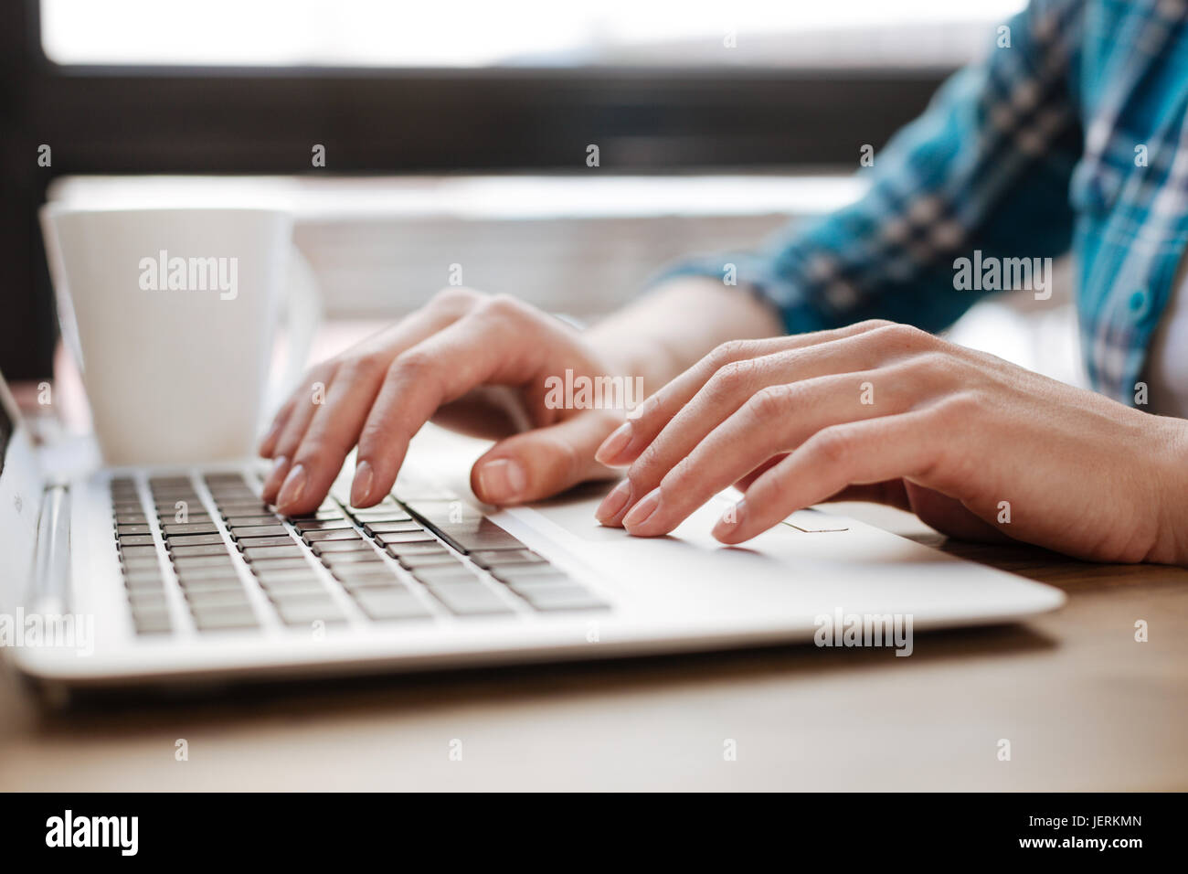 Smart inspired student working on her assignment Stock Photo - Alamy