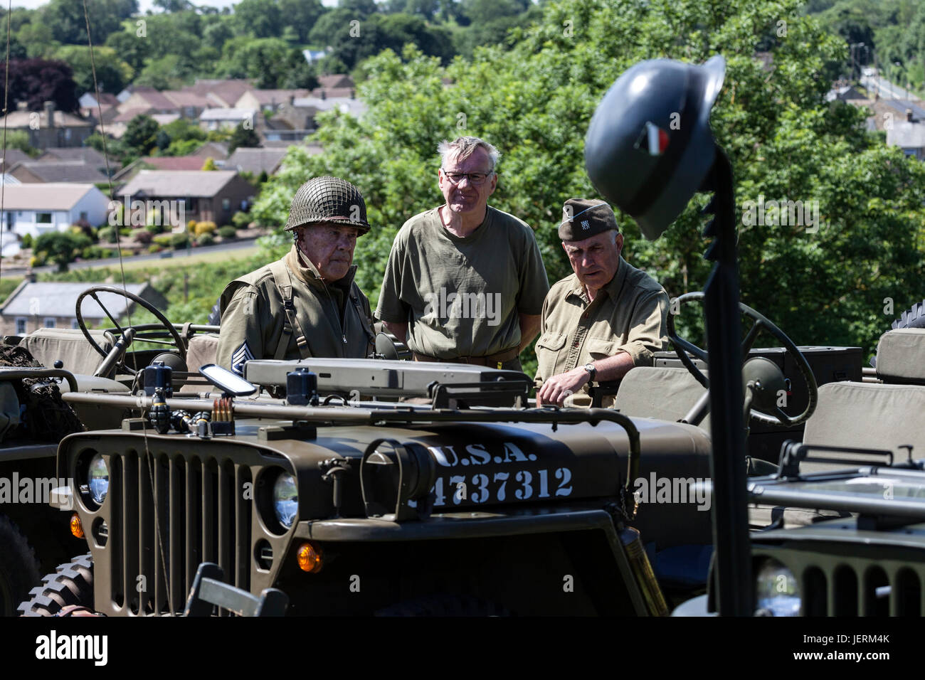 WW2 Re-Enactors Dressed in American Uniforms Next to a Willys Jeep During the 2017 Barnard Castle 1940's Weekend, County Durham, UK. Stock Photo