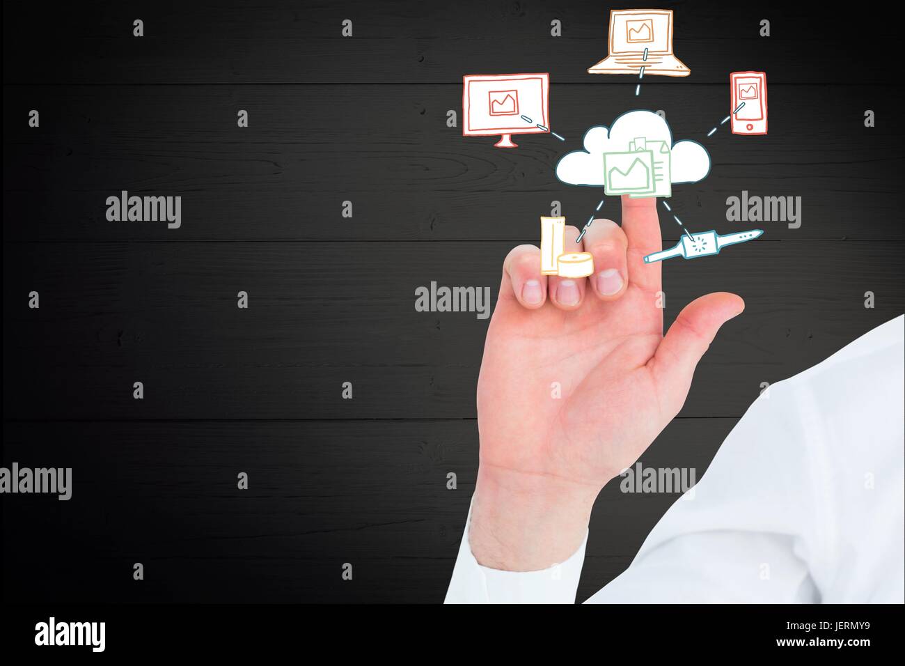Hand pointing on technology icons Stock Photo - Alamy
