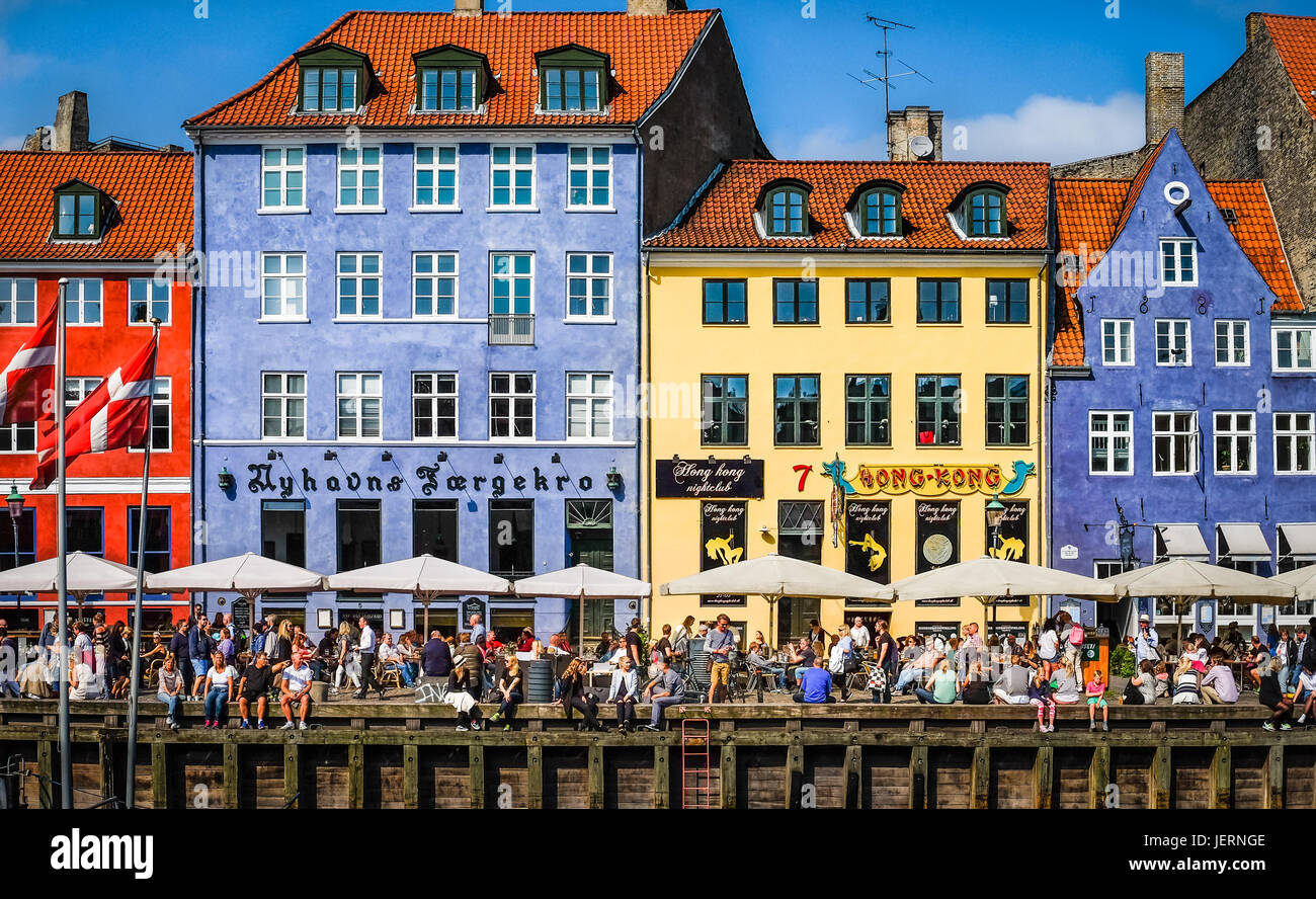COPENHAGEN, DENMARK - JULY 31, 2015: Summer view of the famous Nyhavn with its colorful buildings and city life Stock Photo