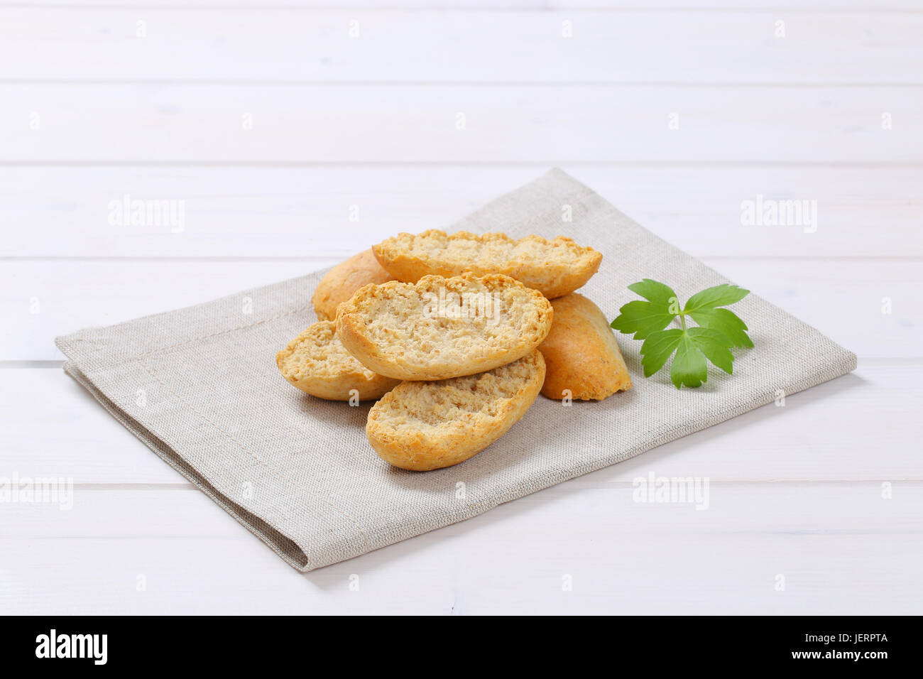 pile of crispy rusks on beige place mat Stock Photo