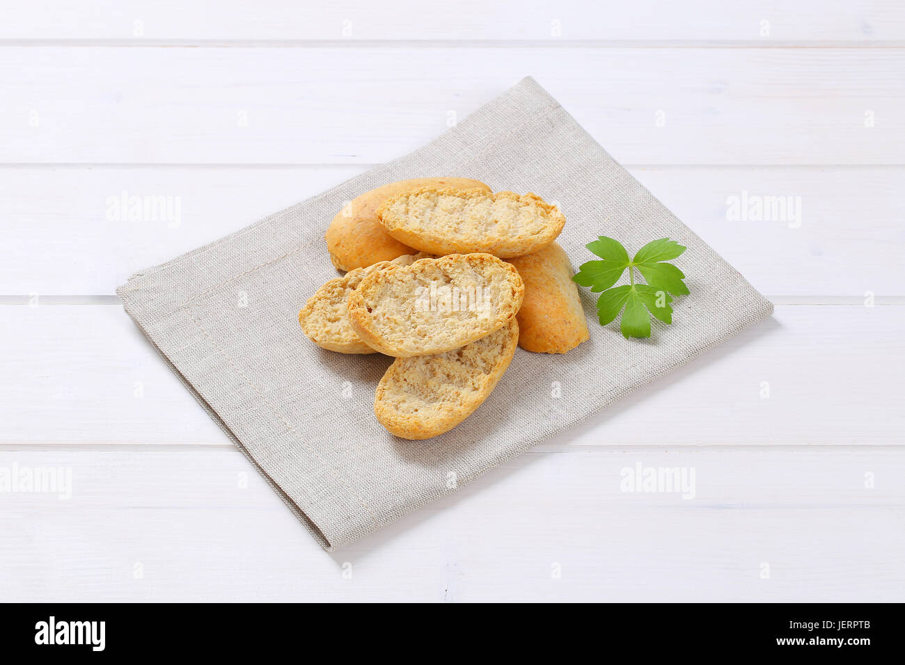 pile of crispy rusks on beige place mat Stock Photo