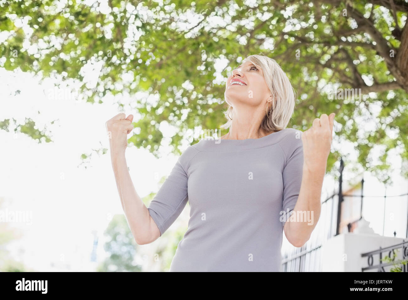 Mature woman fist happy hi-res stock photography and images - Alamy