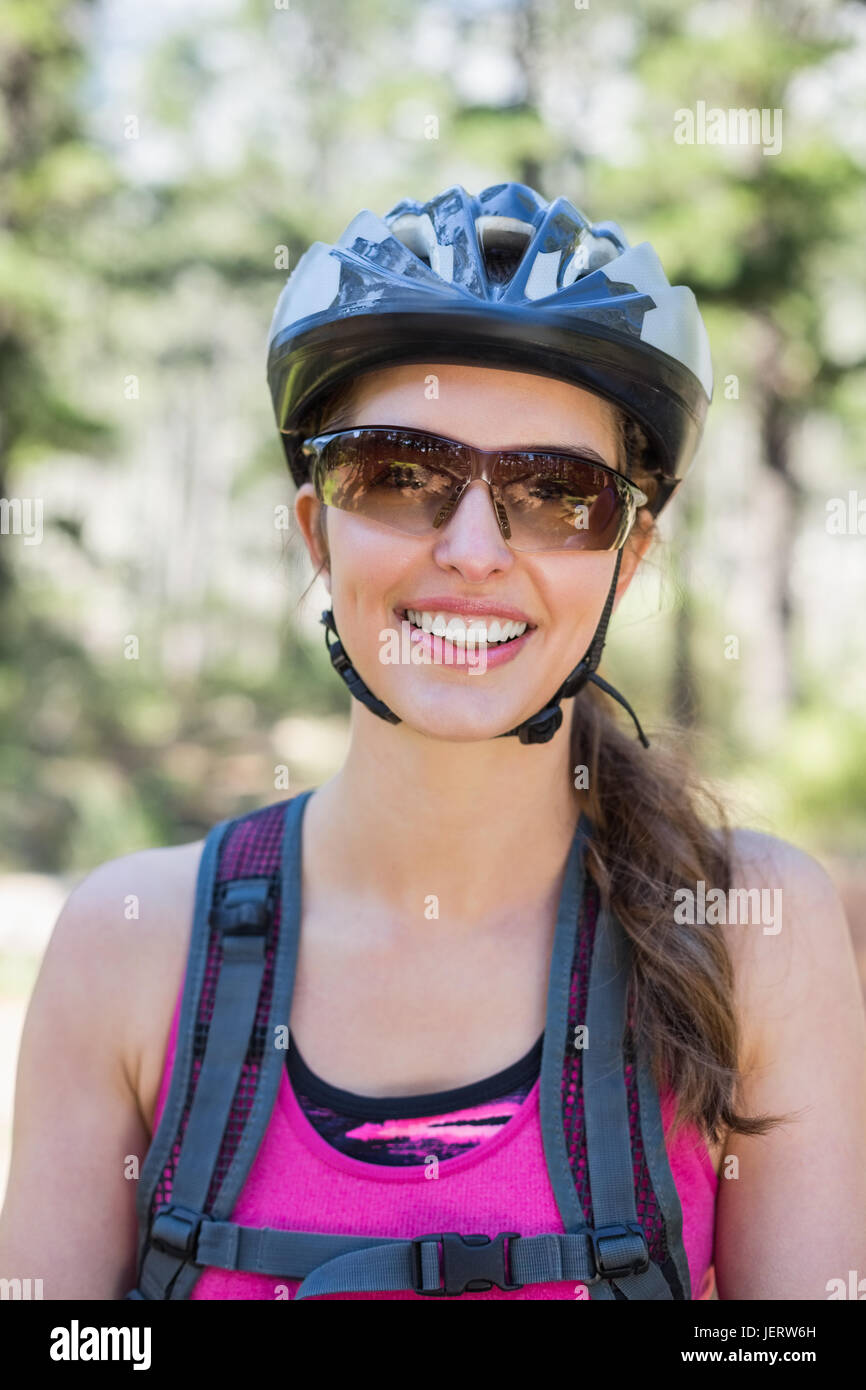 Portrait of beautiful woman wearing helmet Stock Photo - Alamy
