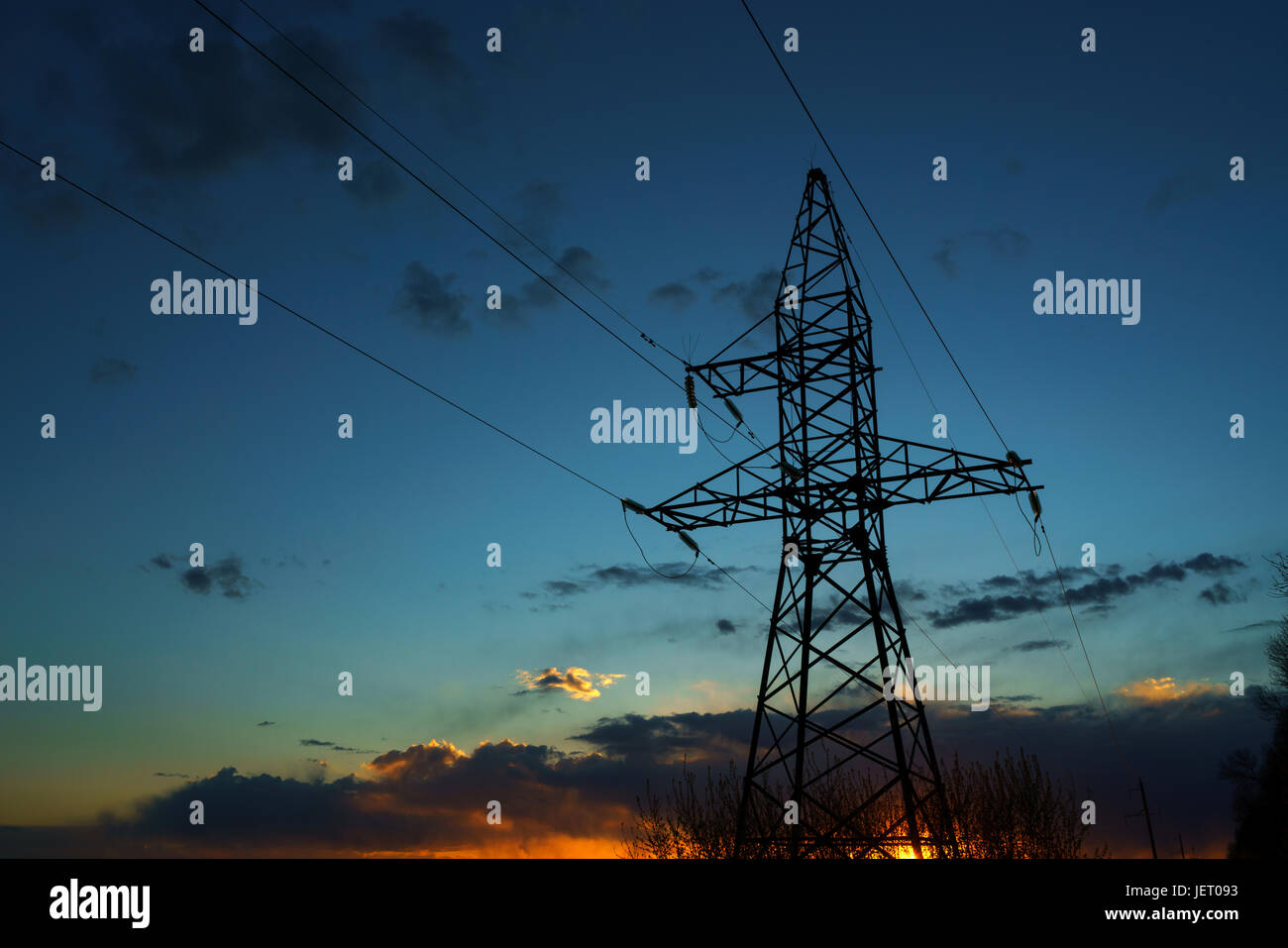 Power lines against the sky at sunset or at sunrise Stock Photo - Alamy