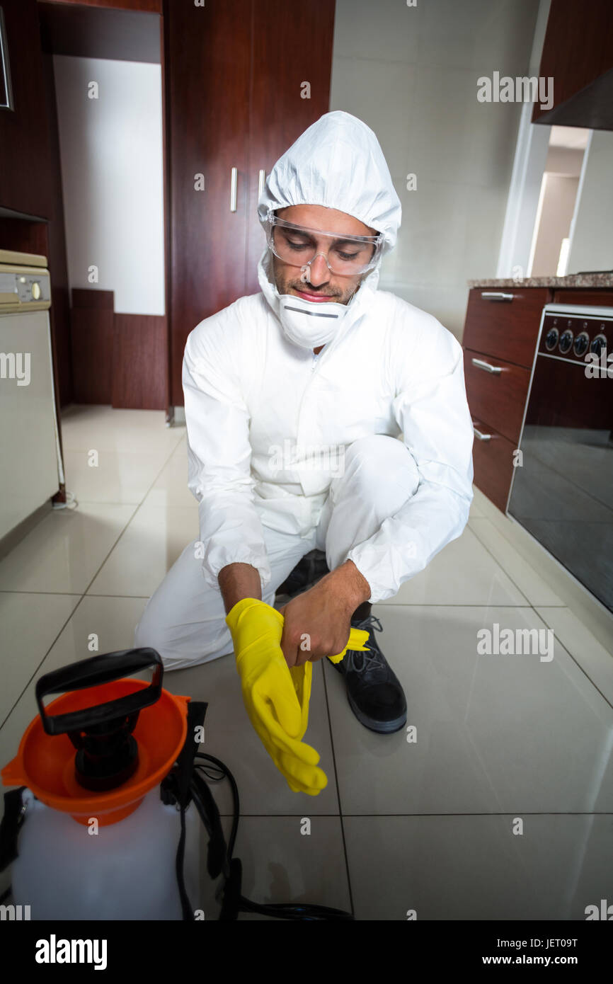 Manual worker wearing gloves Stock Photo