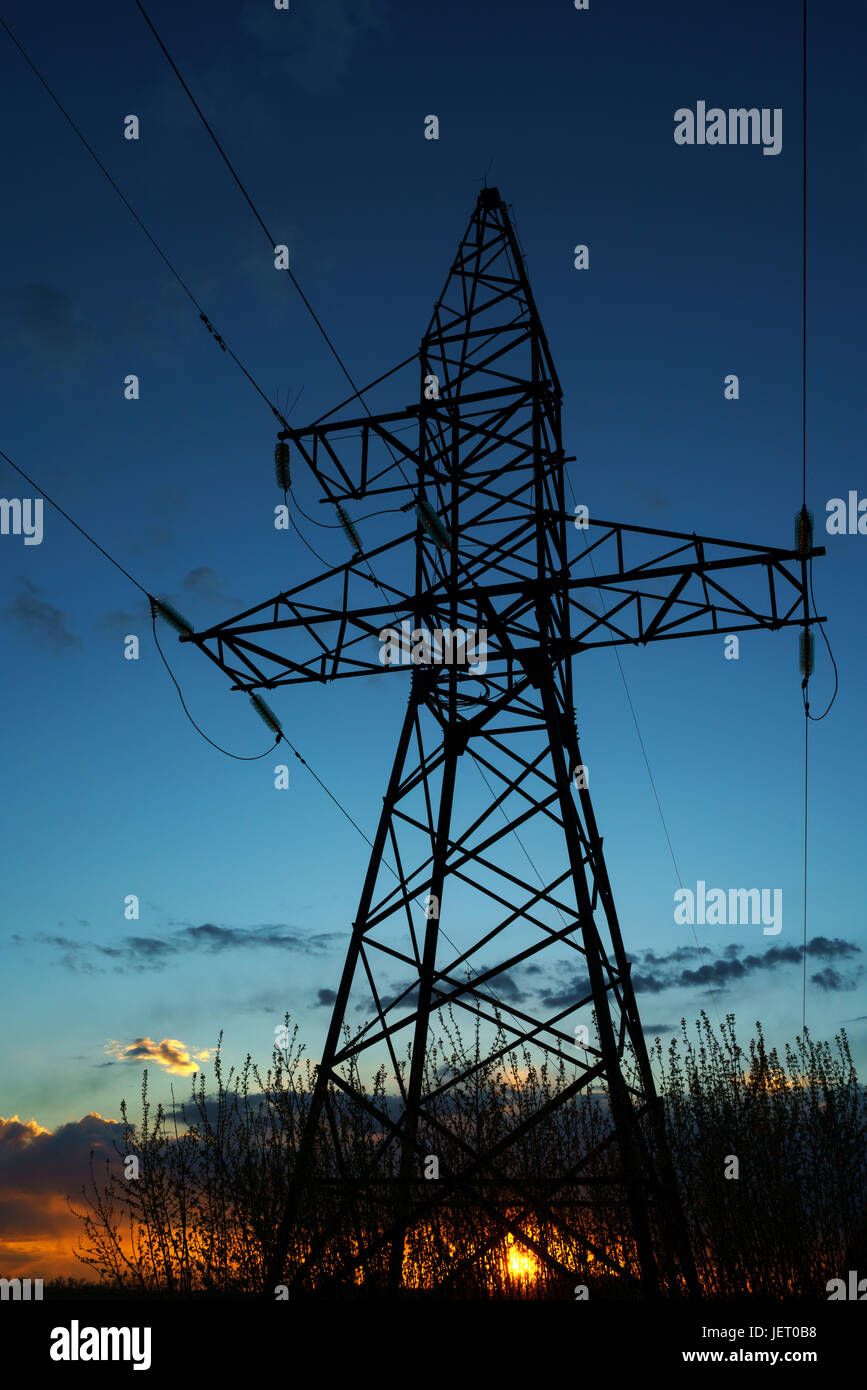 Power lines against the sky at sunset or at sunrise Stock Photo - Alamy