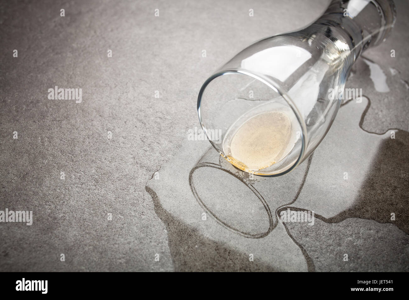Drunk driving concept spilled beer and car keys on a table Stock