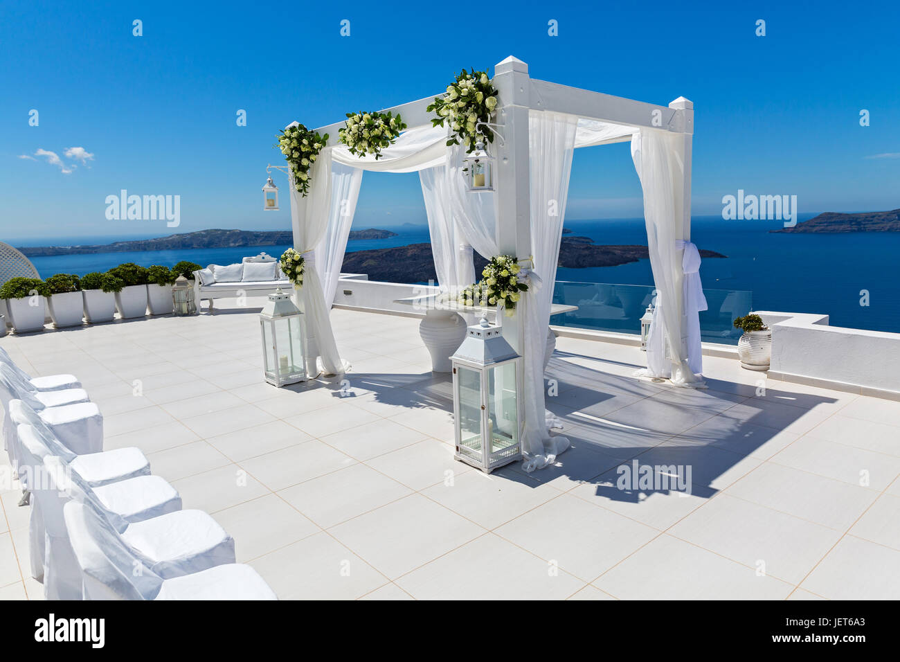Wedding decorations with roses on the background of the sea, Greece,  Santorini Stock Photo - Alamy
