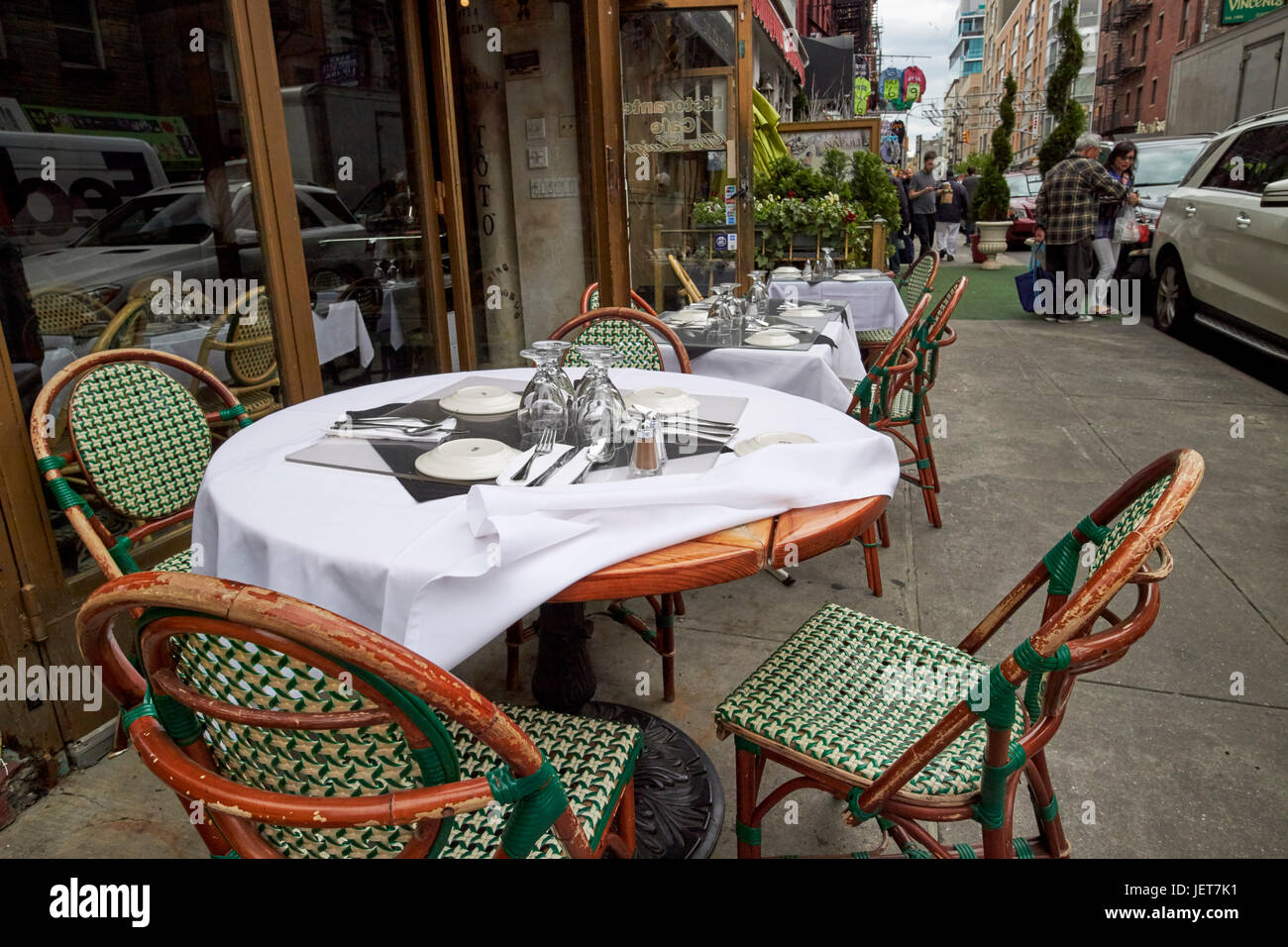 al fresco cafe tables in little italy New York City USA Stock Photo
