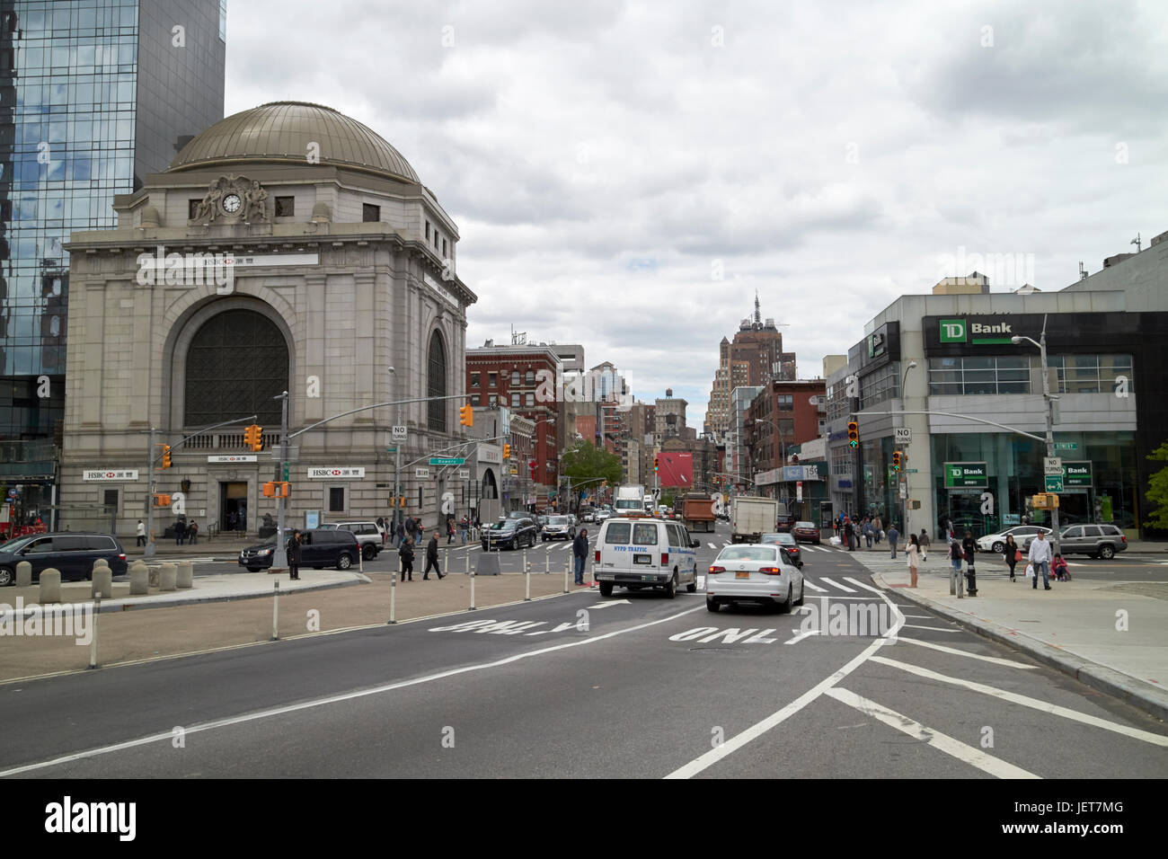 looking along canal street at junction with bowery New York City USA Stock Photo